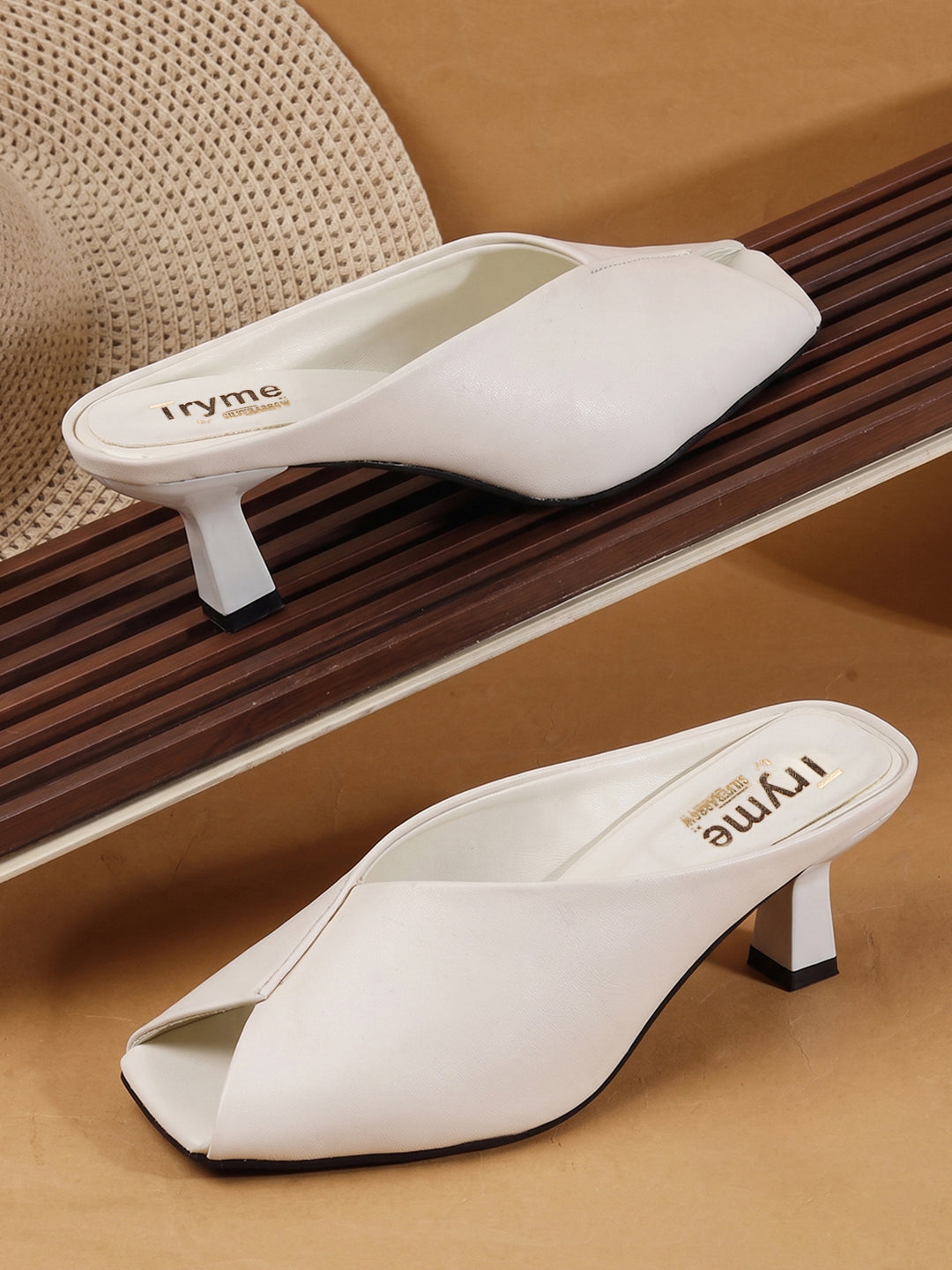 Curve Charm Twisted Upper Square Toe Heel Mules