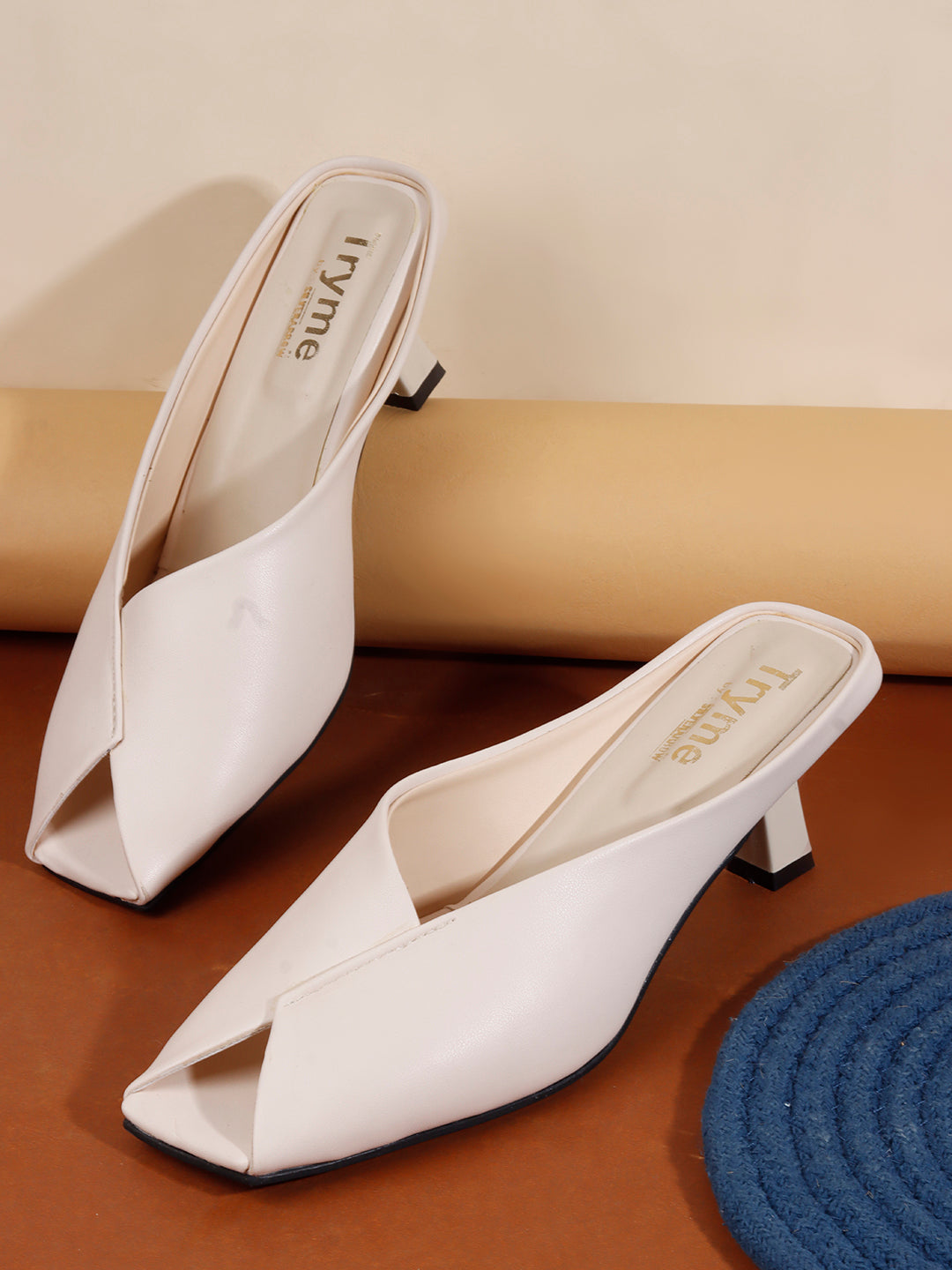 Curve Charm Twisted Upper Square Toe Heel Mules